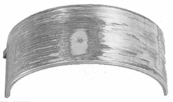 Particles behind the bearing